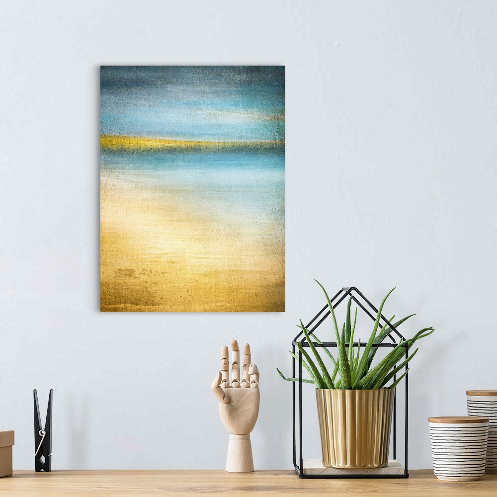 A bohemian room featuring Blue and gold beach scene with turquoise water and hills on the horizon shot on Glimps Holms isla...