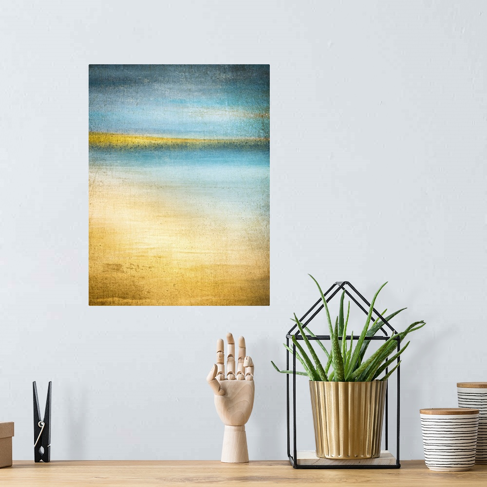 A bohemian room featuring Blue and gold beach scene with turquoise water and hills on the horizon shot on Glimps Holms isla...