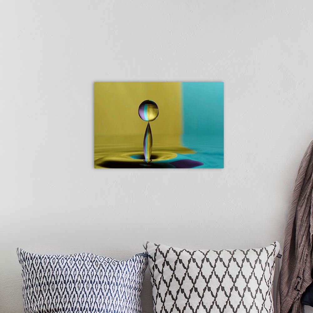 A bohemian room featuring A macro photograph of a water droplet sitting suspended in air against an abstract background.