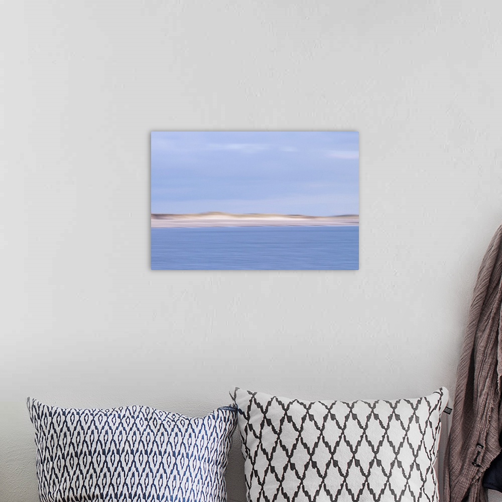 A bohemian room featuring Artistically blurred photo. View on the golden dunes on the shore of the North Sea.