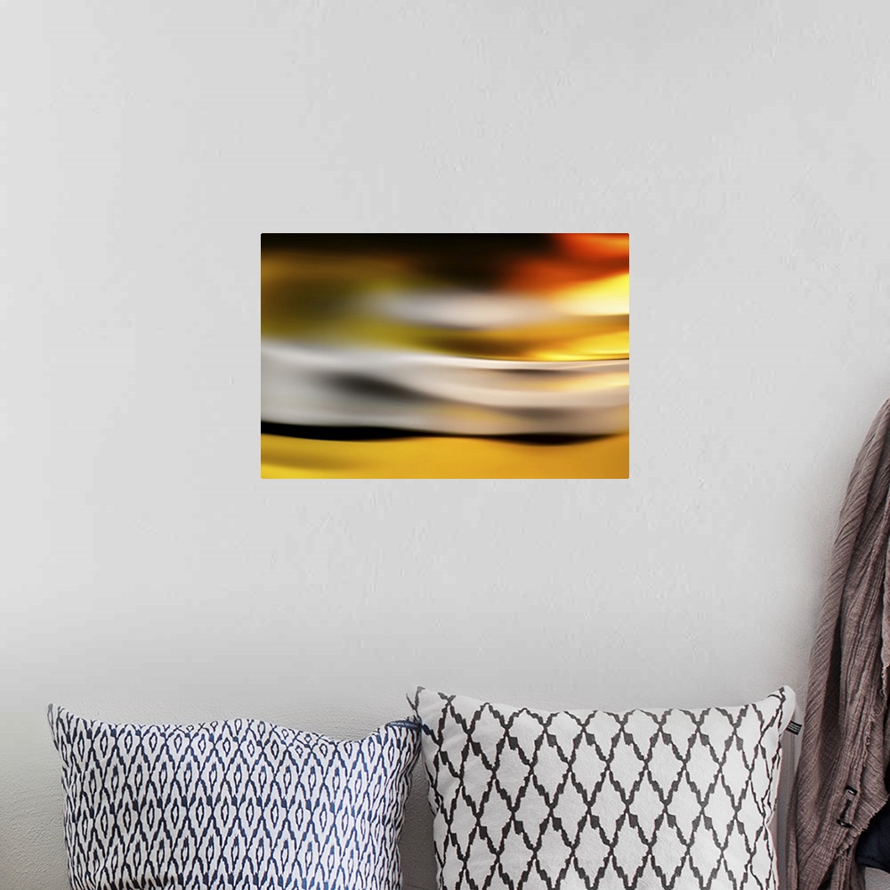 A bohemian room featuring Abstract image of a golden glow at sunset.