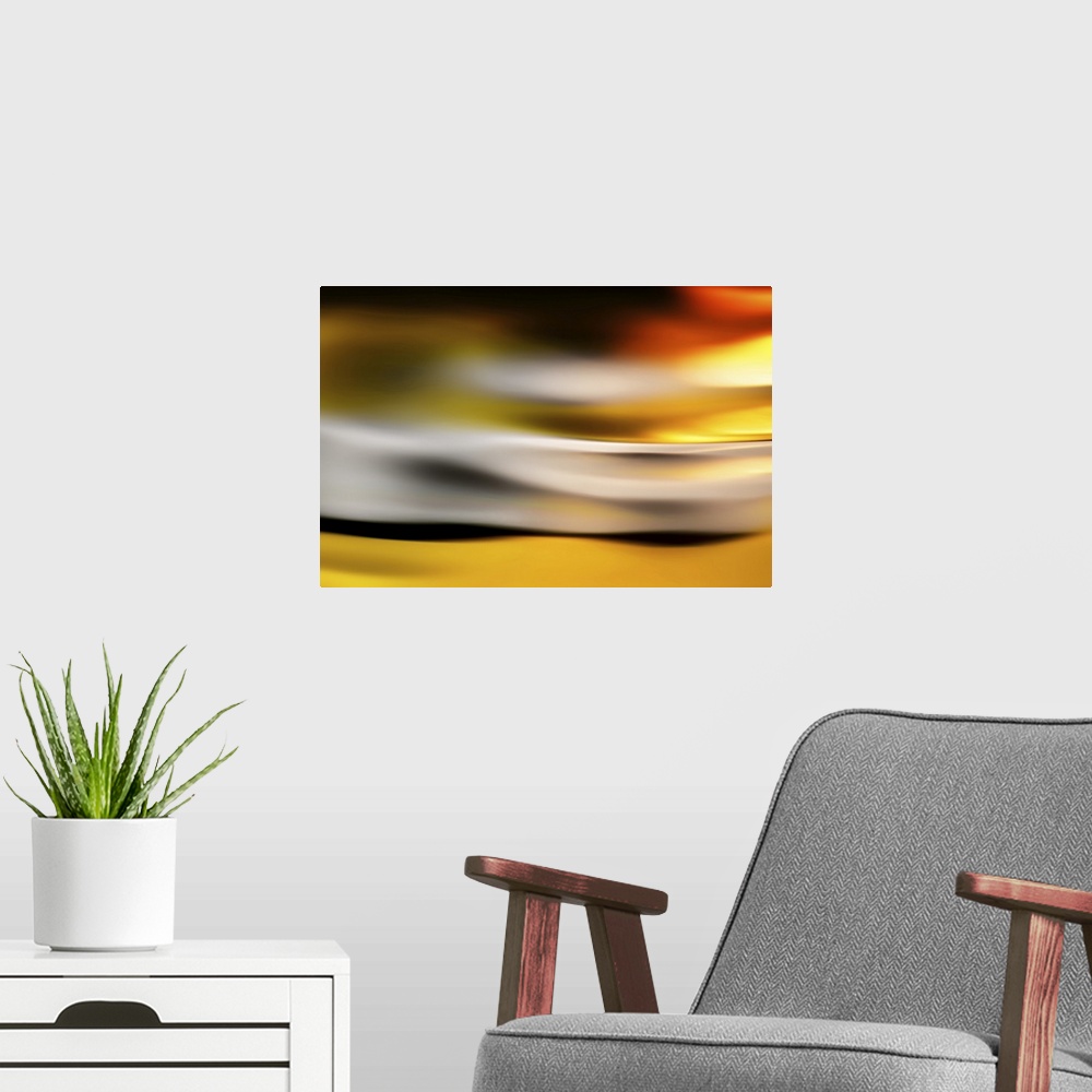 A modern room featuring Abstract image of a golden glow at sunset.