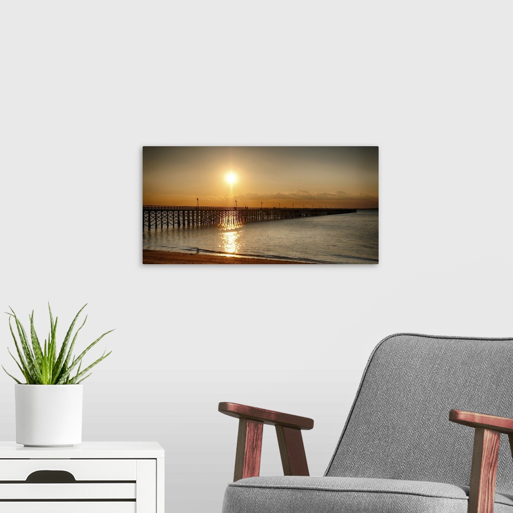 A modern room featuring Golden Sunlight over a Wooden Pier, Keansburg, Monmouth County, New Jersey, USA.