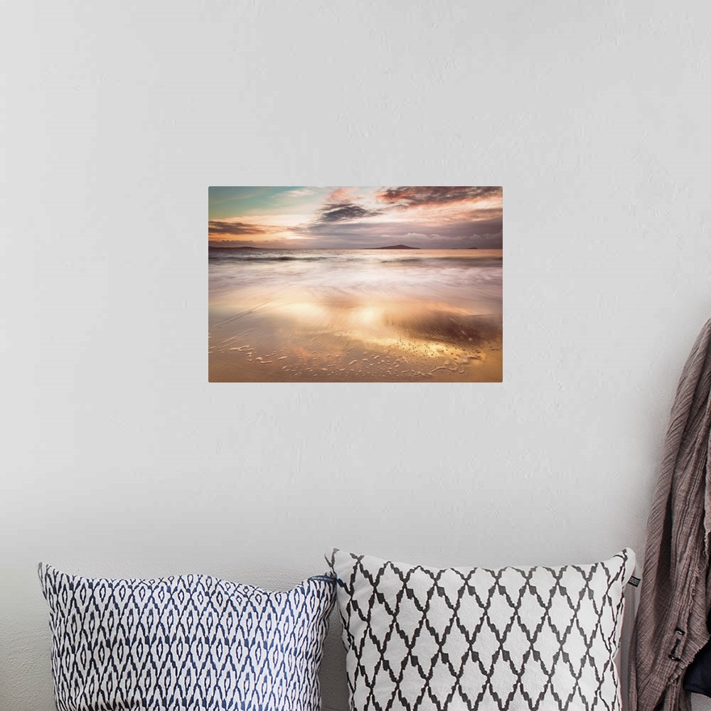A bohemian room featuring Gold beach at sunset.