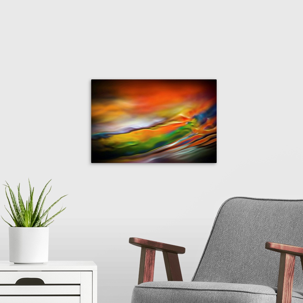 A modern room featuring Abstract art with colorful waves of color running horizontally and going towards the top across t...