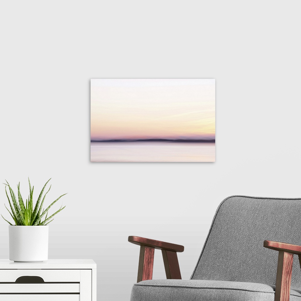 A modern room featuring Artistically blurred photo. A sunset like a fairy tale when the sun is kissing us goodnight.