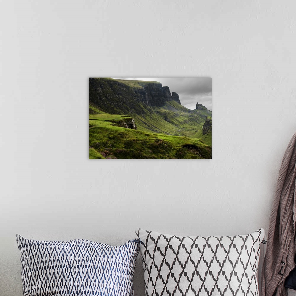 A bohemian room featuring Fine art photo of a misty valley surrounded by steep cliffs.