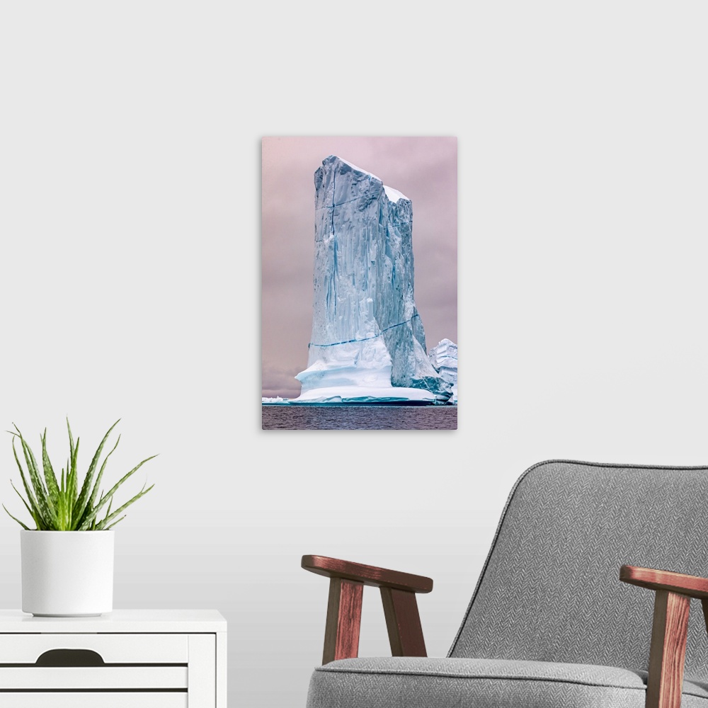 A modern room featuring Eastern Greenland, massive iceberg.