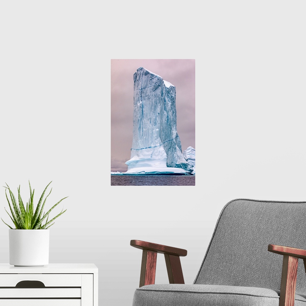 A modern room featuring Eastern Greenland, massive iceberg.