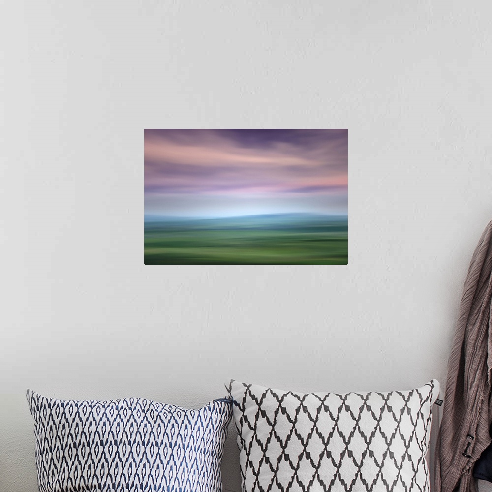 A bohemian room featuring Long exposure image of the Palouse hills with a lavender sky.