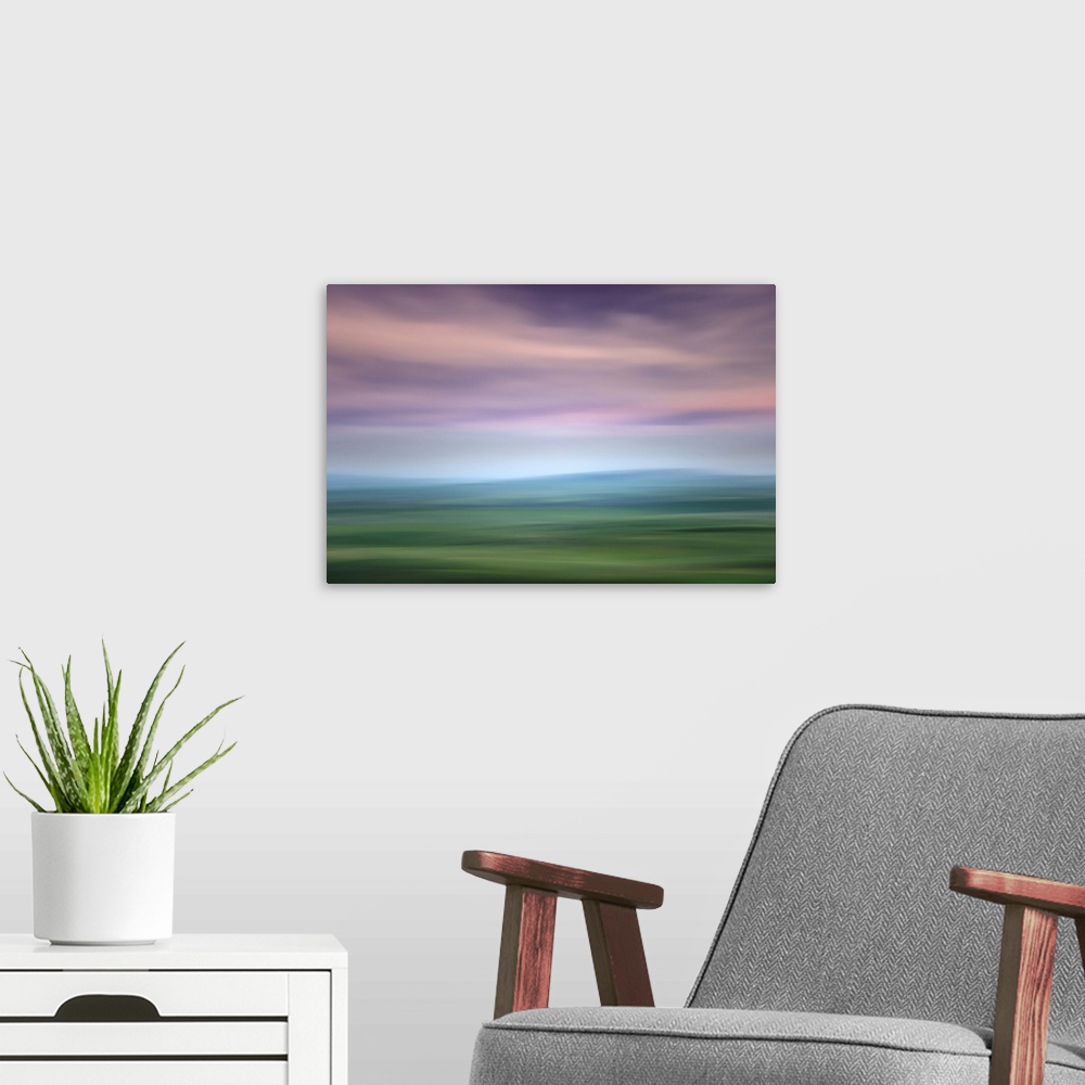 A modern room featuring Long exposure image of the Palouse hills with a lavender sky.
