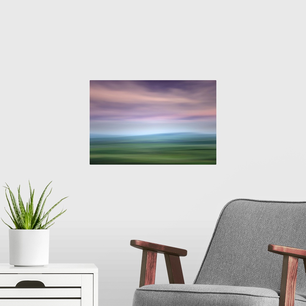 A modern room featuring Long exposure image of the Palouse hills with a lavender sky.