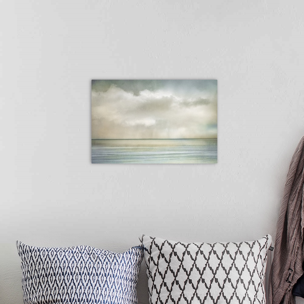 A bohemian room featuring Cloudscape manipulated image of clouds over the ocean on a sunny morning.
