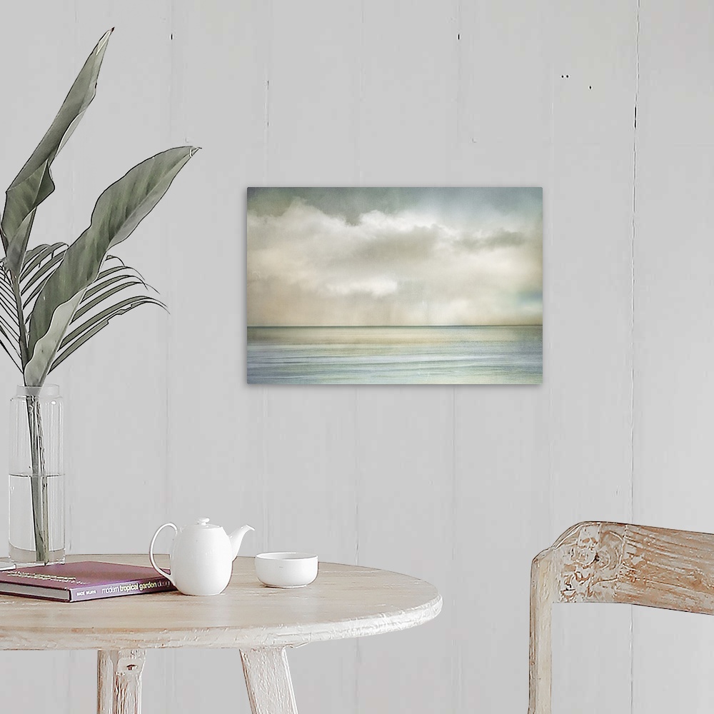 A farmhouse room featuring Cloudscape manipulated image of clouds over the ocean on a sunny morning.