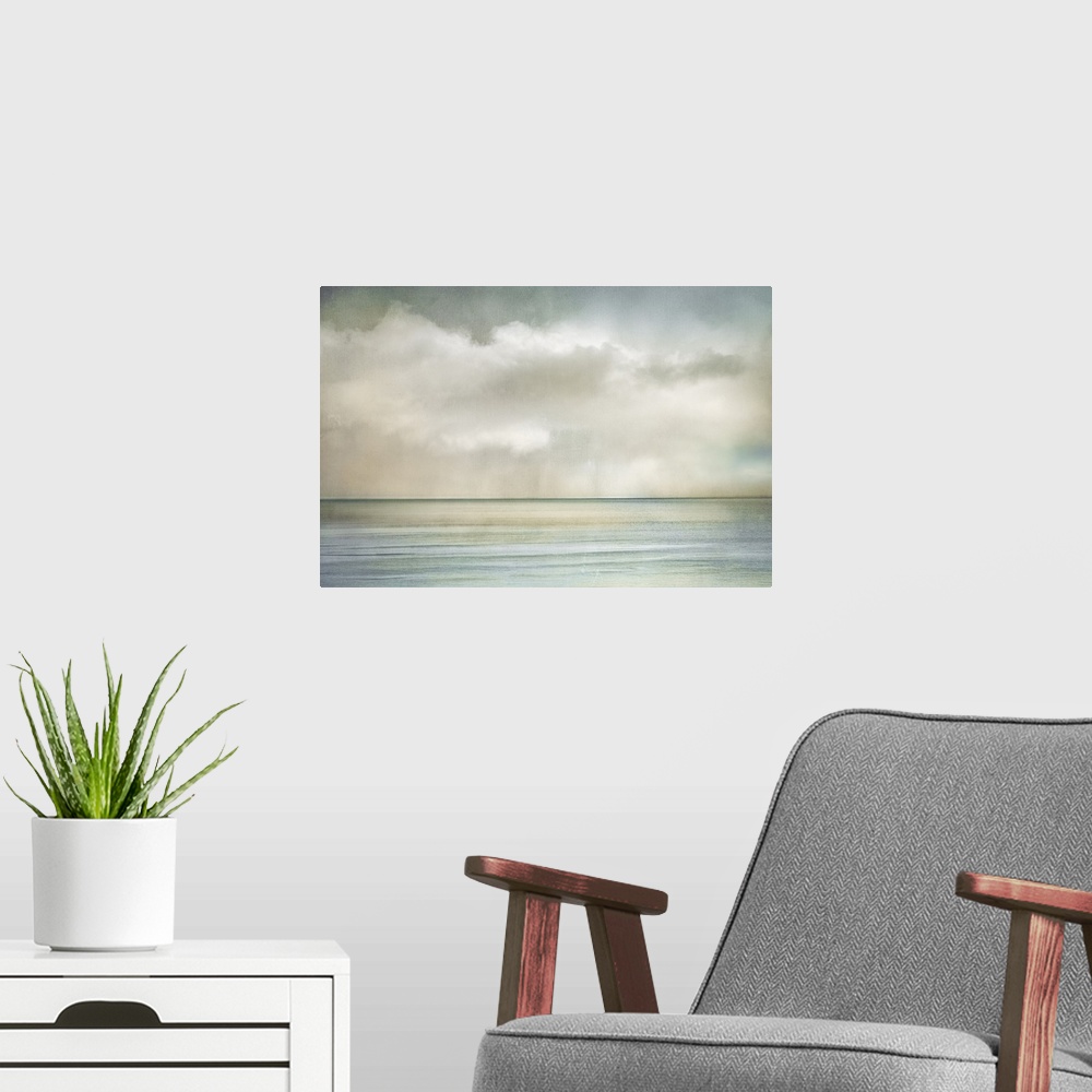 A modern room featuring Cloudscape manipulated image of clouds over the ocean on a sunny morning.