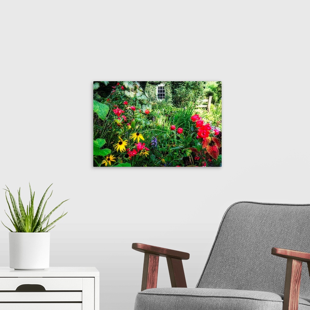 A modern room featuring Large wall art of garden Flowers blooming in Willowwood Arboretum.