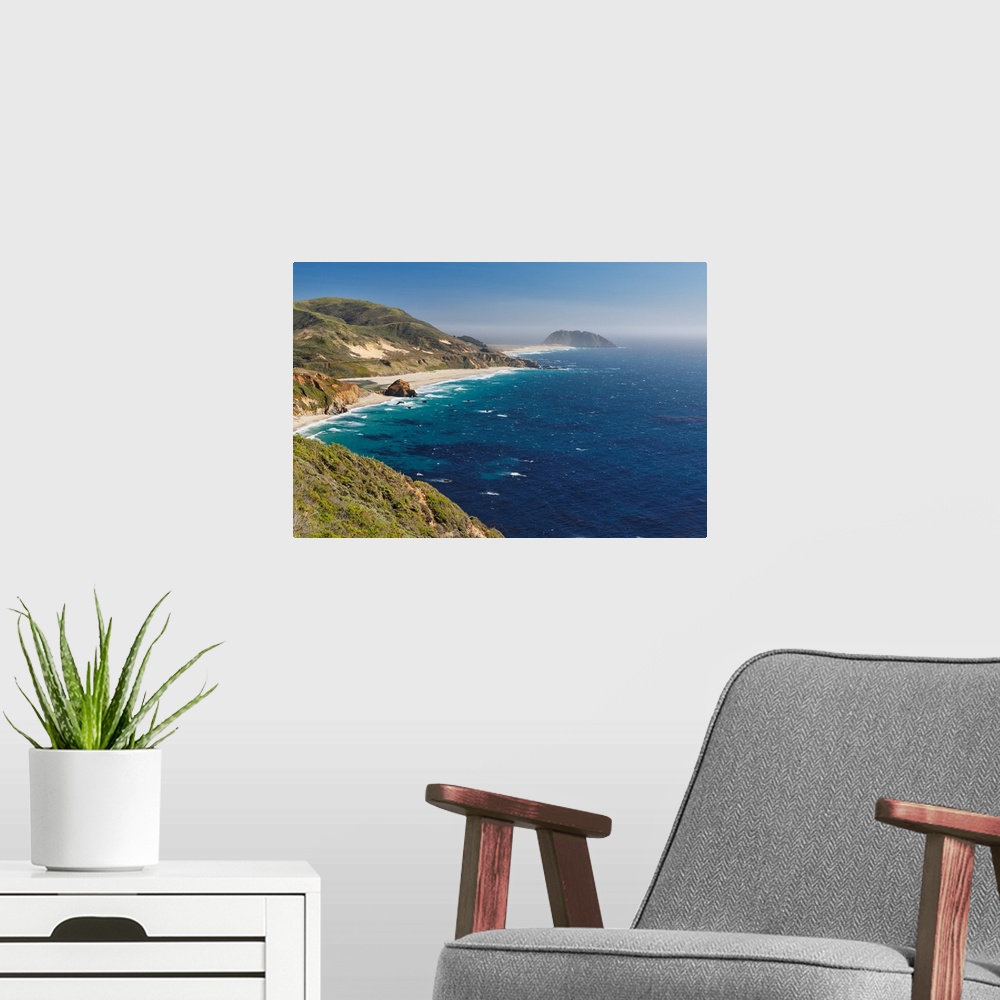 A modern room featuring Big Sur Coast with Coastal Route 1 and the Point Sur Lighthouse, California, USA.