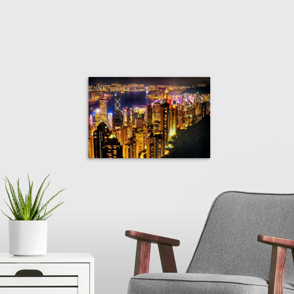 A modern room featuring High angle view of Hong Kong night skyline from the Victoria Peak.