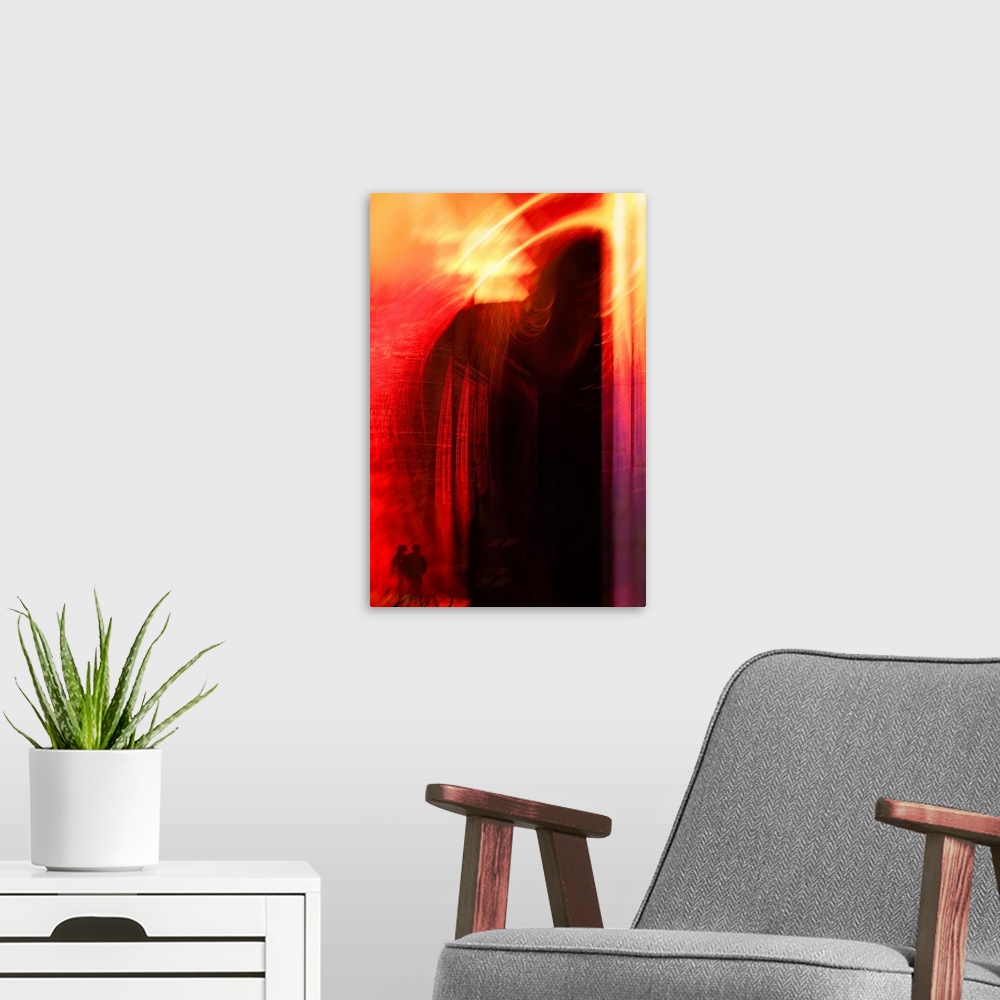 A modern room featuring Abstract vertical photograph of swirls of bright red and yellow light with a couple with a bicycl...