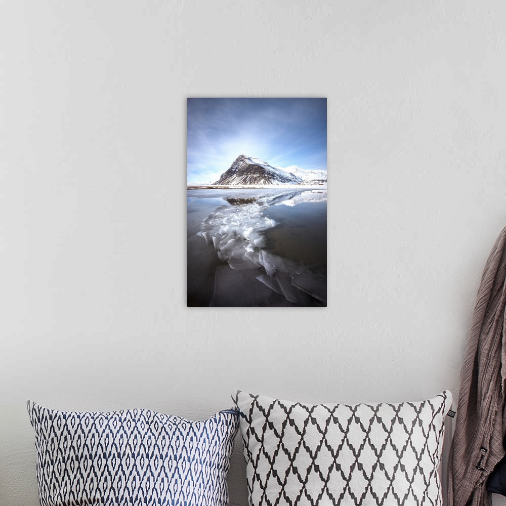 A bohemian room featuring Ice floes in the frigid waters below Kirkjufell mountain Iceland.