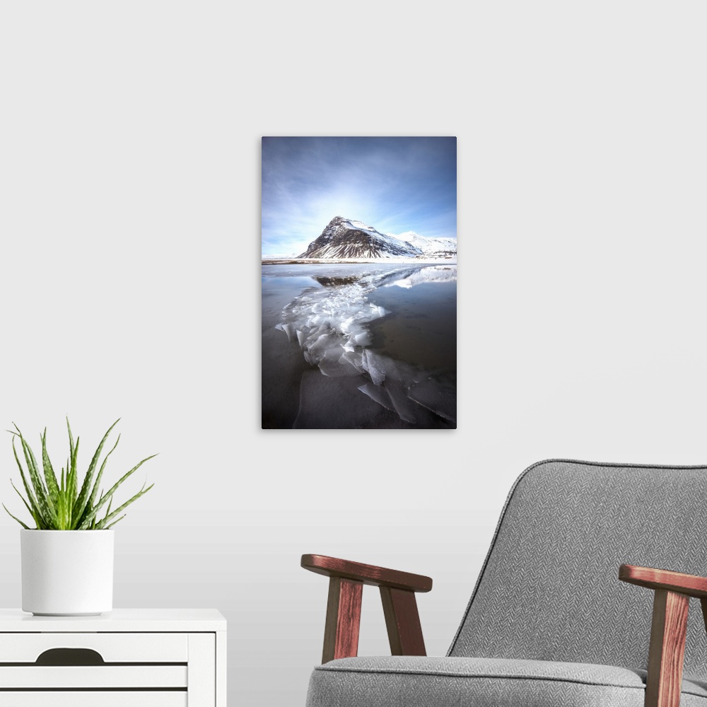 A modern room featuring Ice floes in the frigid waters below Kirkjufell mountain Iceland.