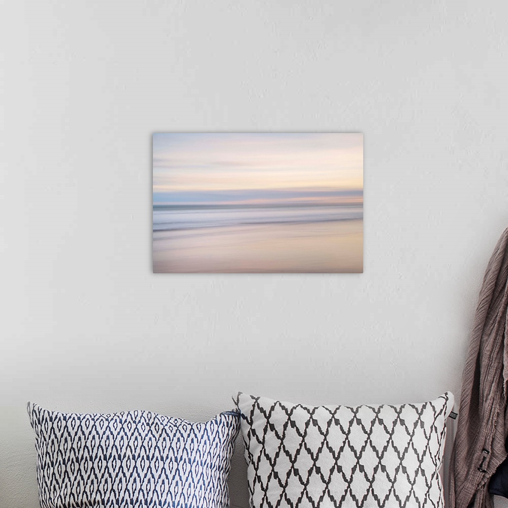 A bohemian room featuring Abstract artistic photograph of a smooth pale colors moving horizontally.