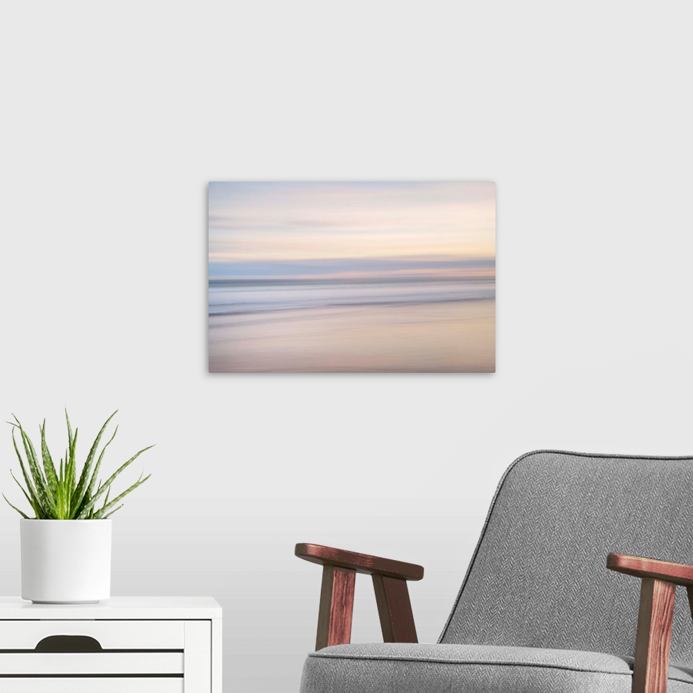A modern room featuring Abstract artistic photograph of a smooth pale colors moving horizontally.