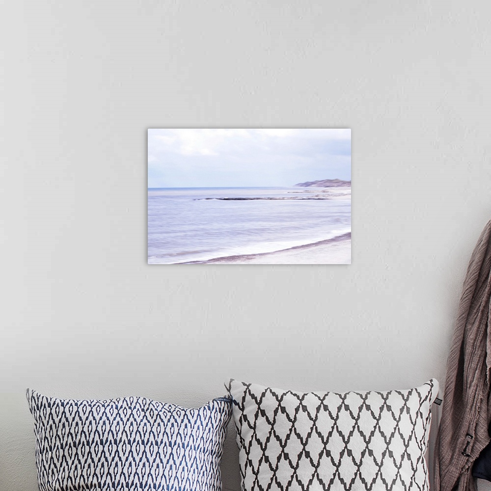 A bohemian room featuring Artistically blurred photo. The North Sea beach and dunes of North Jutland, Denmark, in summer.