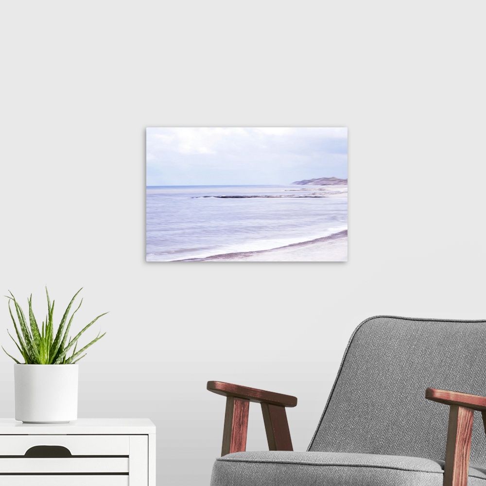 A modern room featuring Artistically blurred photo. The North Sea beach and dunes of North Jutland, Denmark, in summer.