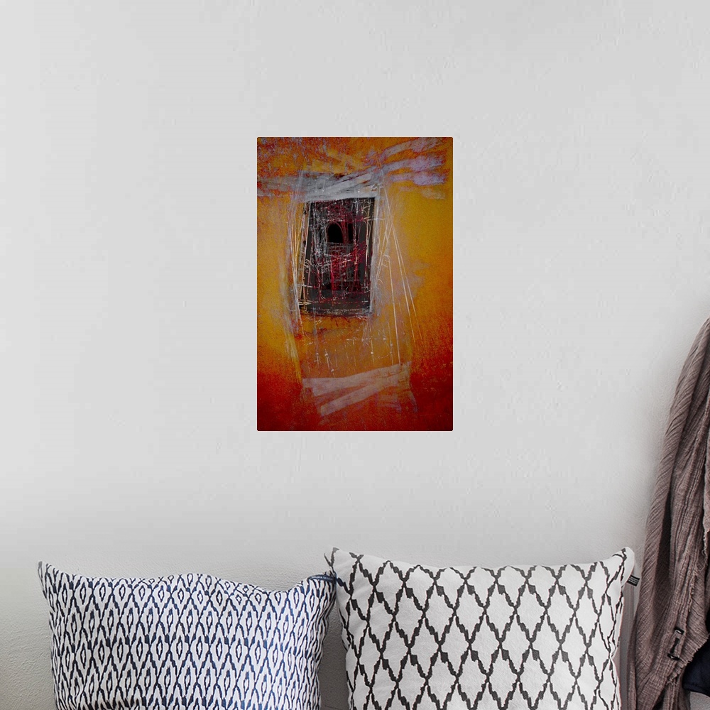 A bohemian room featuring An abstract expressionistic image of a window in a wall in golds, reds, silvers and blues.