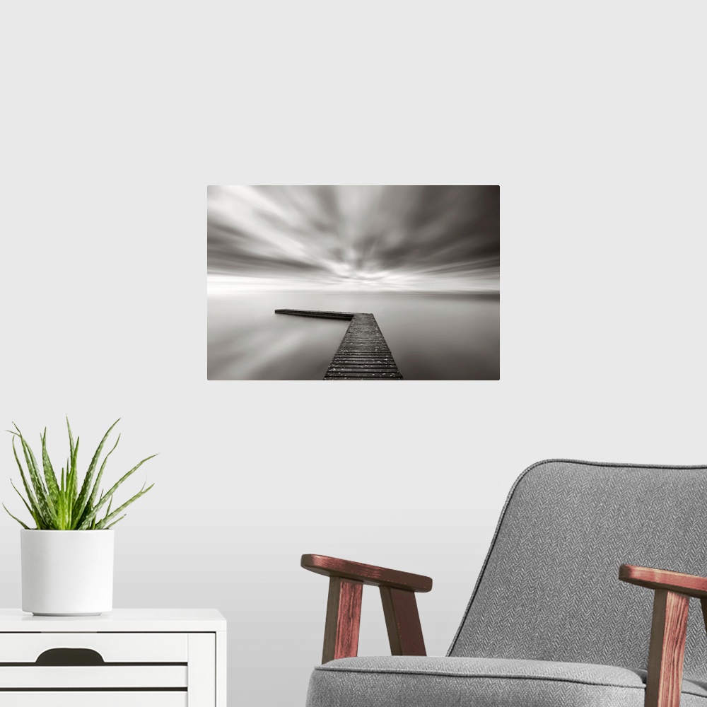 A modern room featuring This wall art is a time lapsed photograph of this lake pier has created a sensation of motion in ...