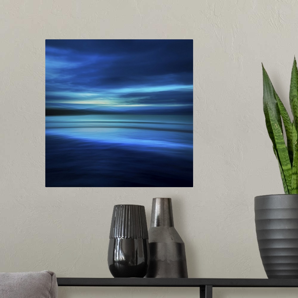 A modern room featuring Blue abstract seascape on a deserted beach at midnight in shades of navy blue and aqua.