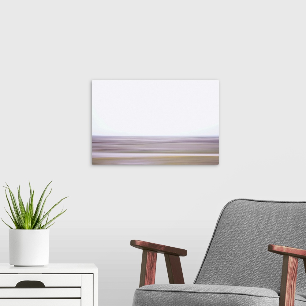 A modern room featuring Artistically blurred photo. The mind wanders to the horizon in this deserted marshes.