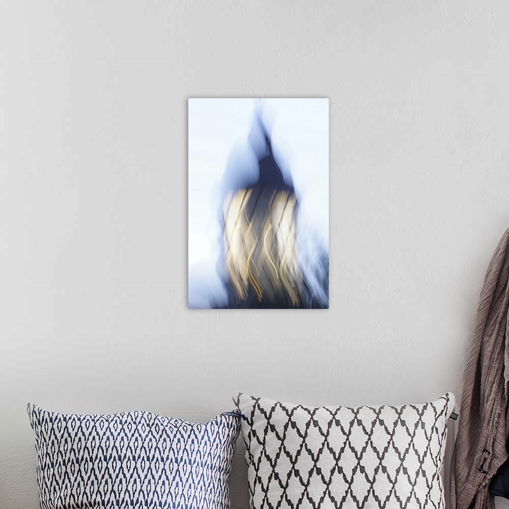 A bohemian room featuring Artistically blurred photo. The light of an old lighthouse gives you a safe guidance into the dar...