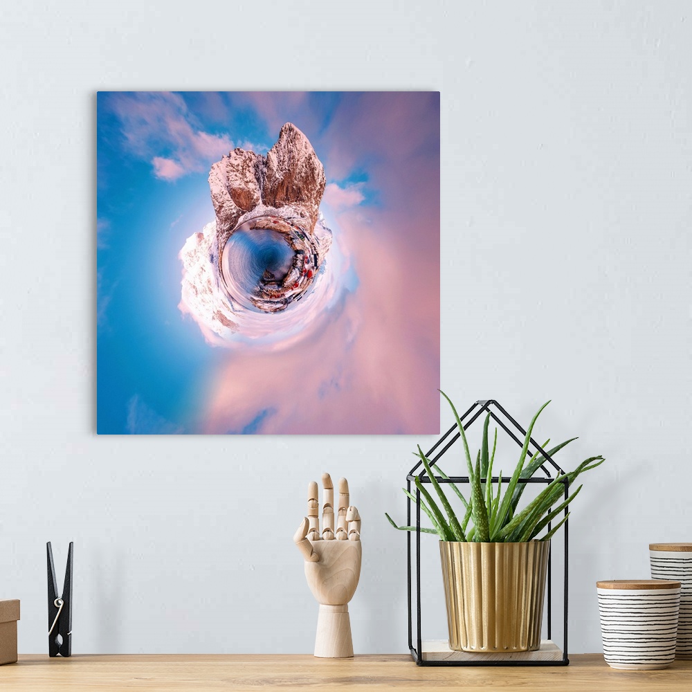 A bohemian room featuring Snow covered mountain peaks at sunset with a pale pink sky, with a stereographic projection effec...