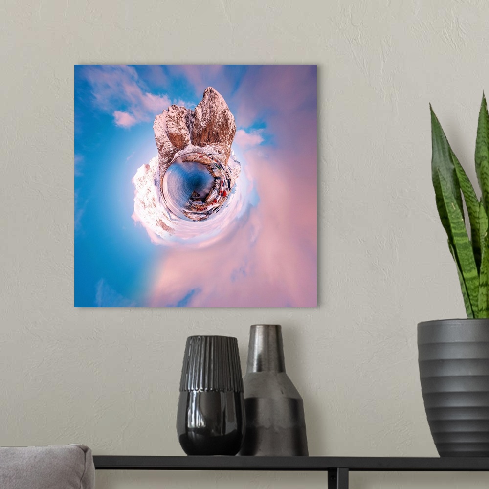 A modern room featuring Snow covered mountain peaks at sunset with a pale pink sky, with a stereographic projection effec...