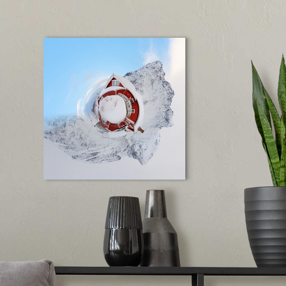 A modern room featuring A red barn surrounded by tall mountains in the winter, with a stereographic projection effect on ...