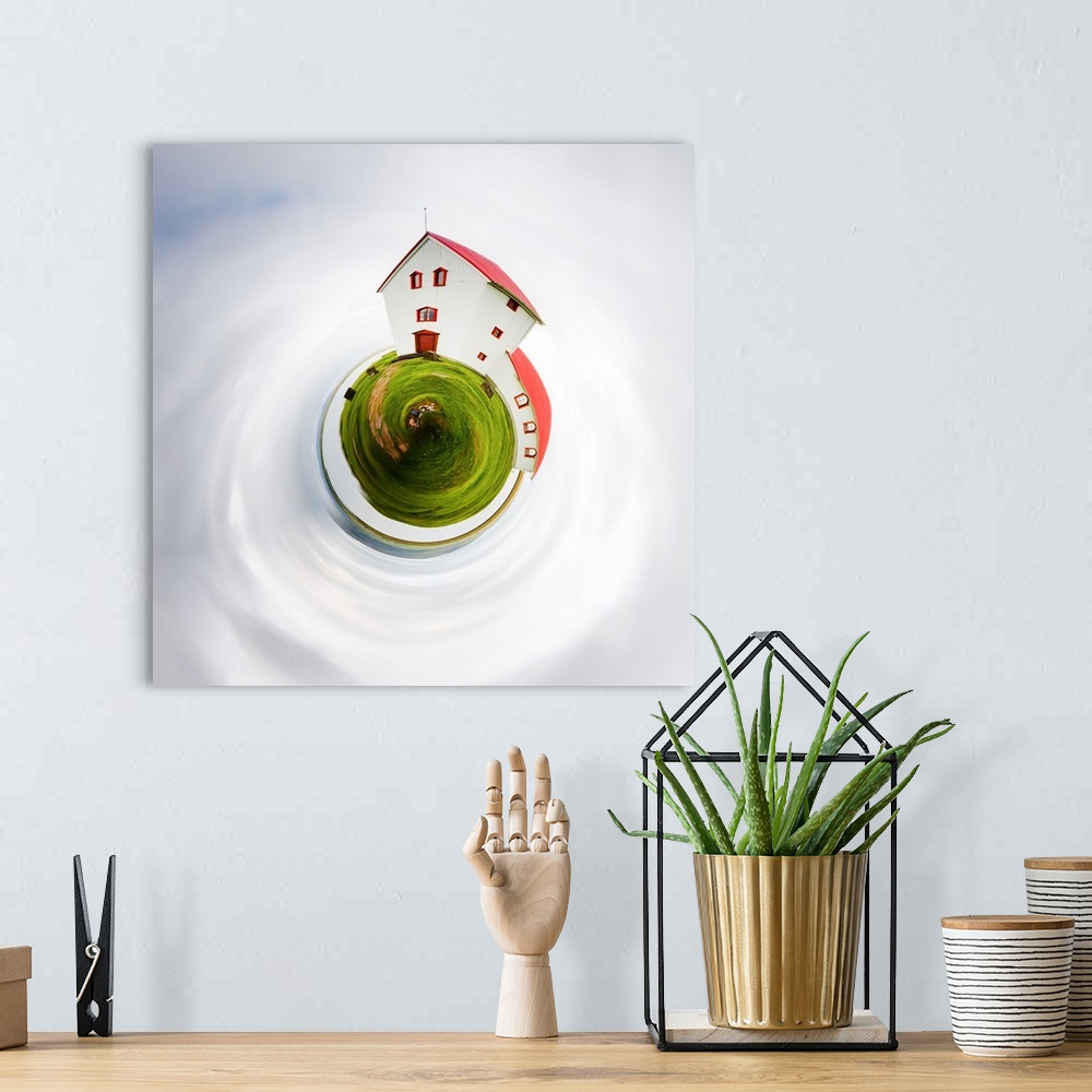 A bohemian room featuring A white house with a red roof on a green lawn, with a stereographic projection effect on the imag...