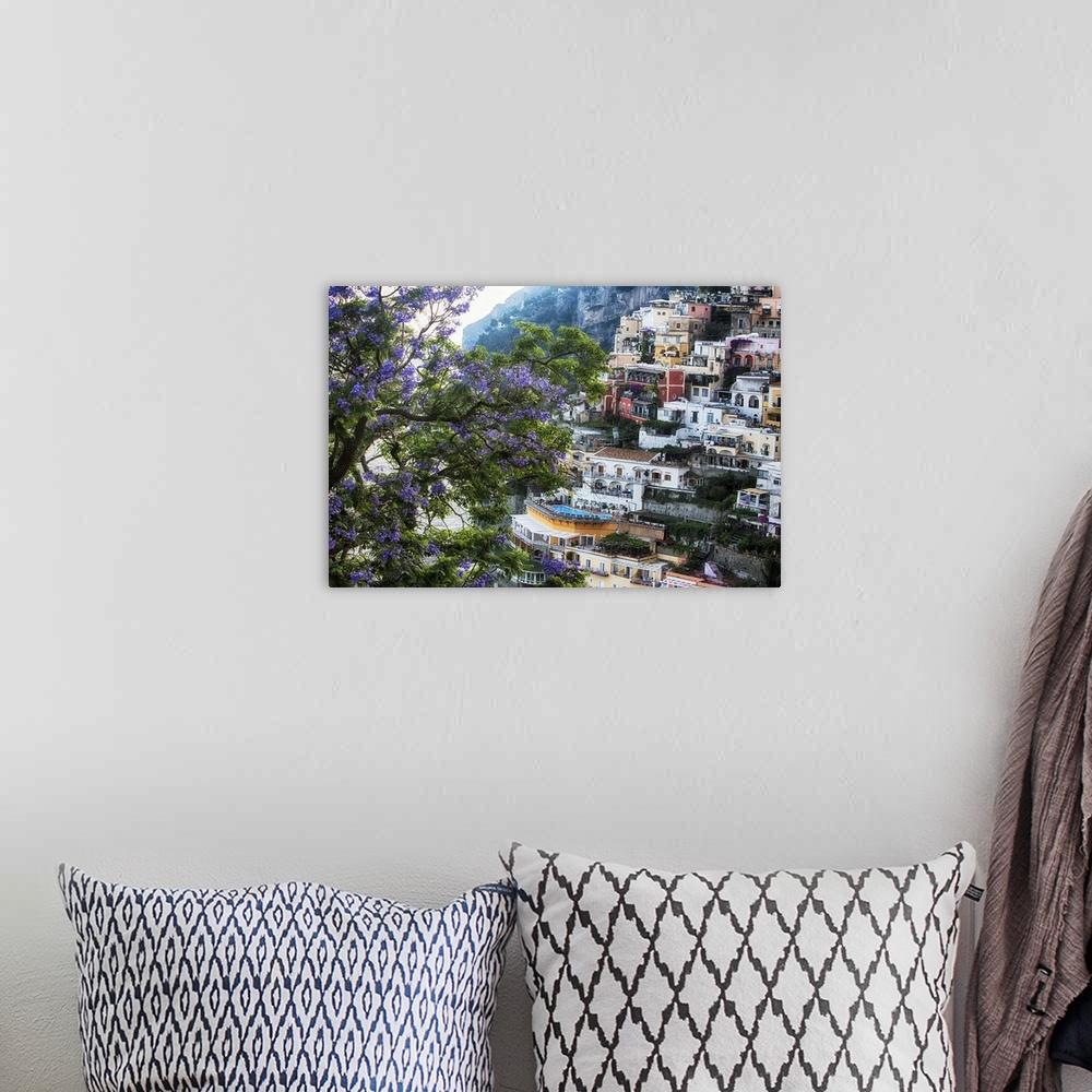 A bohemian room featuring High Angle View of Hillside Houses in Positano with a Blooming Jacaranda