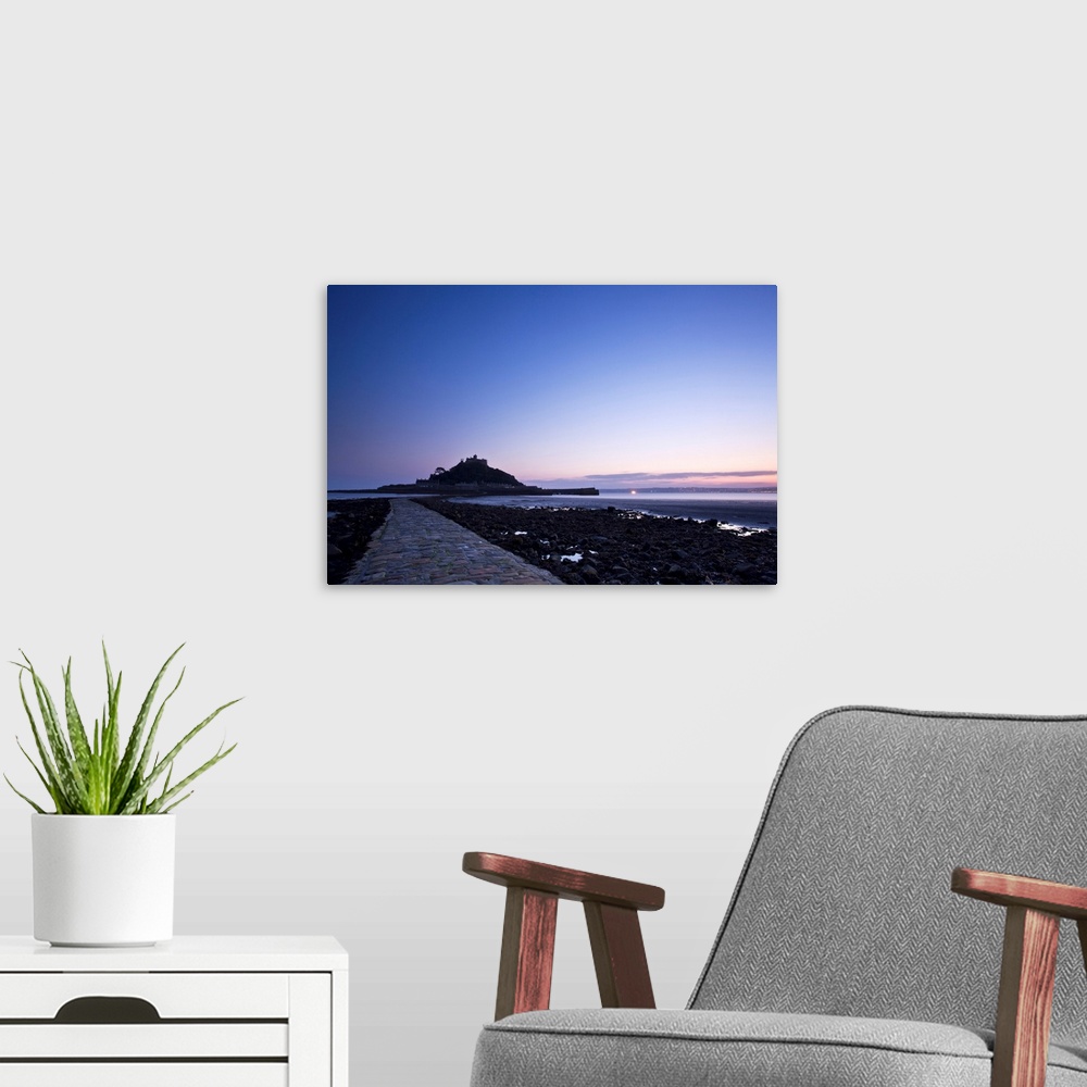 A modern room featuring A beautiful cool blue dawn over the causeway at St. Michaels Mount in Cornwall, England, UK.