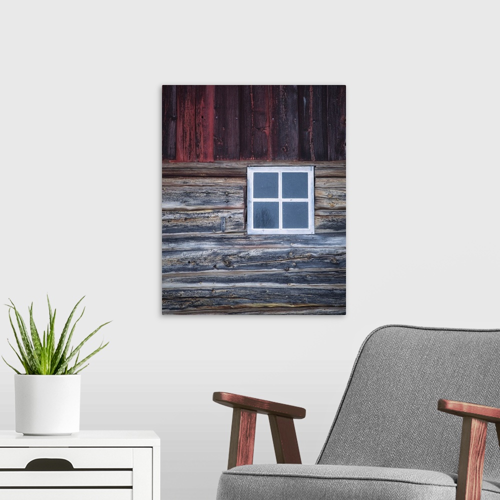A modern room featuring A close-up of an old white window ina weather Norweigian wooden building in the snow with grey an...