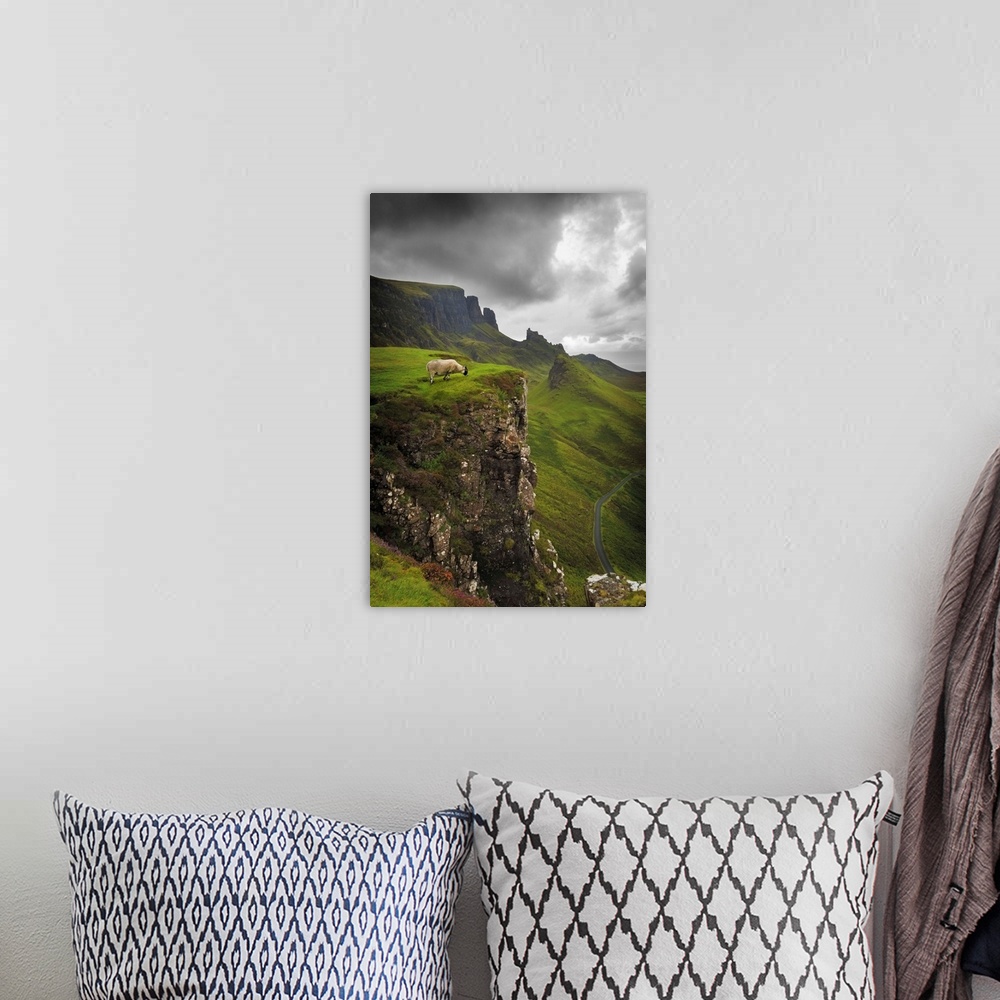 A bohemian room featuring Fine art photo of a misty valley surrounded by steep cliffs with a sheep on one ledge.