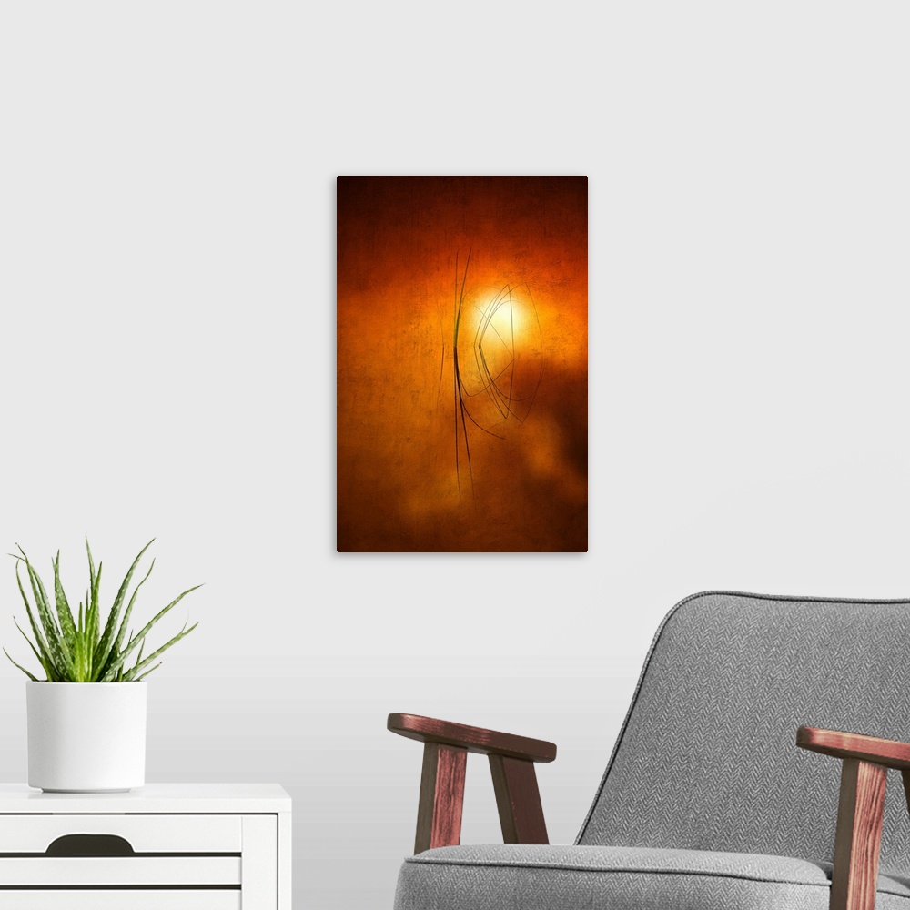 A modern room featuring Fine art photo of a few grasses in a pond with the setting sun in the background.