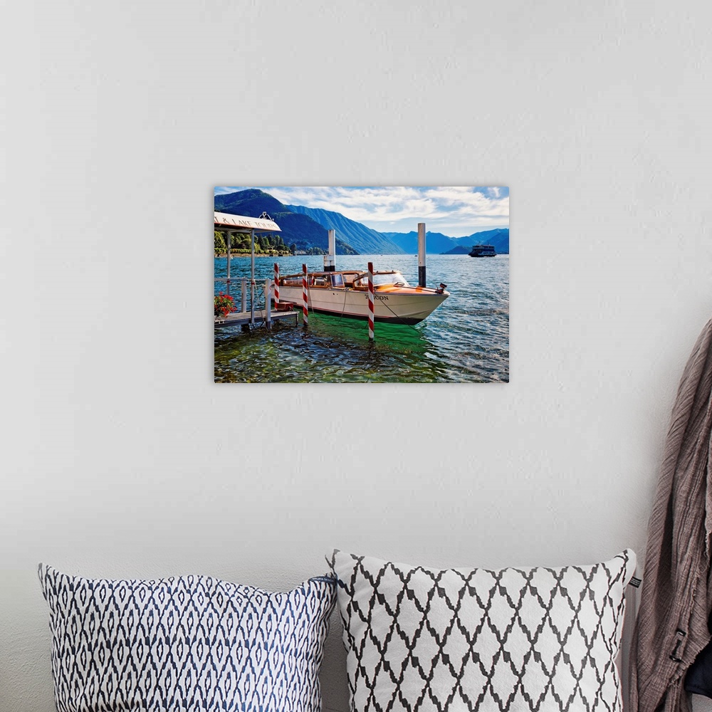 A bohemian room featuring Fine art photo of a boat at the dock in a lake in Como, Italy.