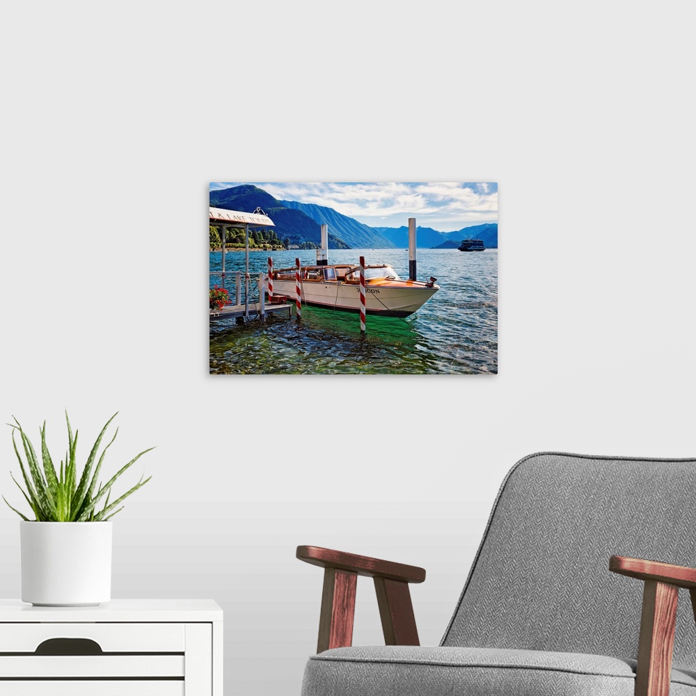 A modern room featuring Fine art photo of a boat at the dock in a lake in Como, Italy.