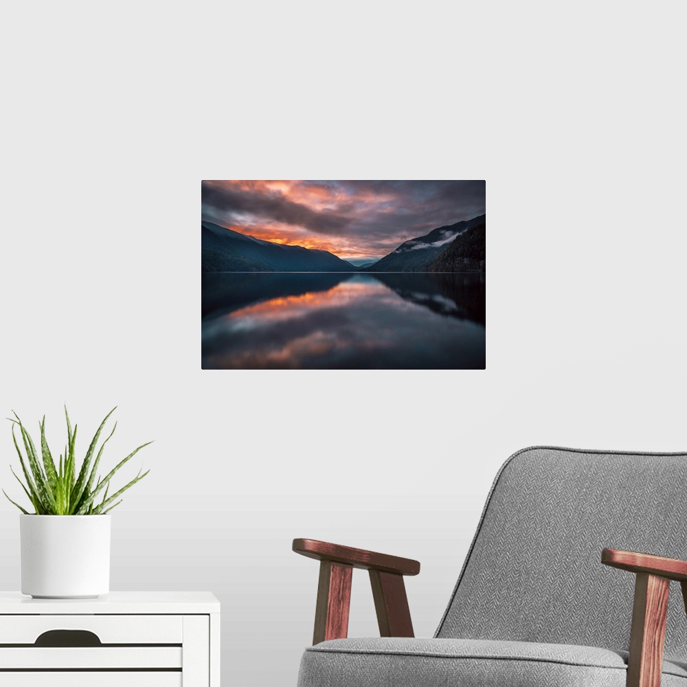 A modern room featuring Long exposure of Crescent Lake of Olympic National Park in a fiery sunset.