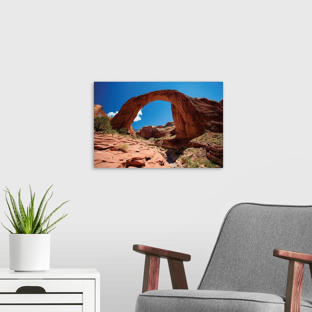 A modern room featuring Low angle view of a Natural Arch, Rainbow Bridge, Utah.