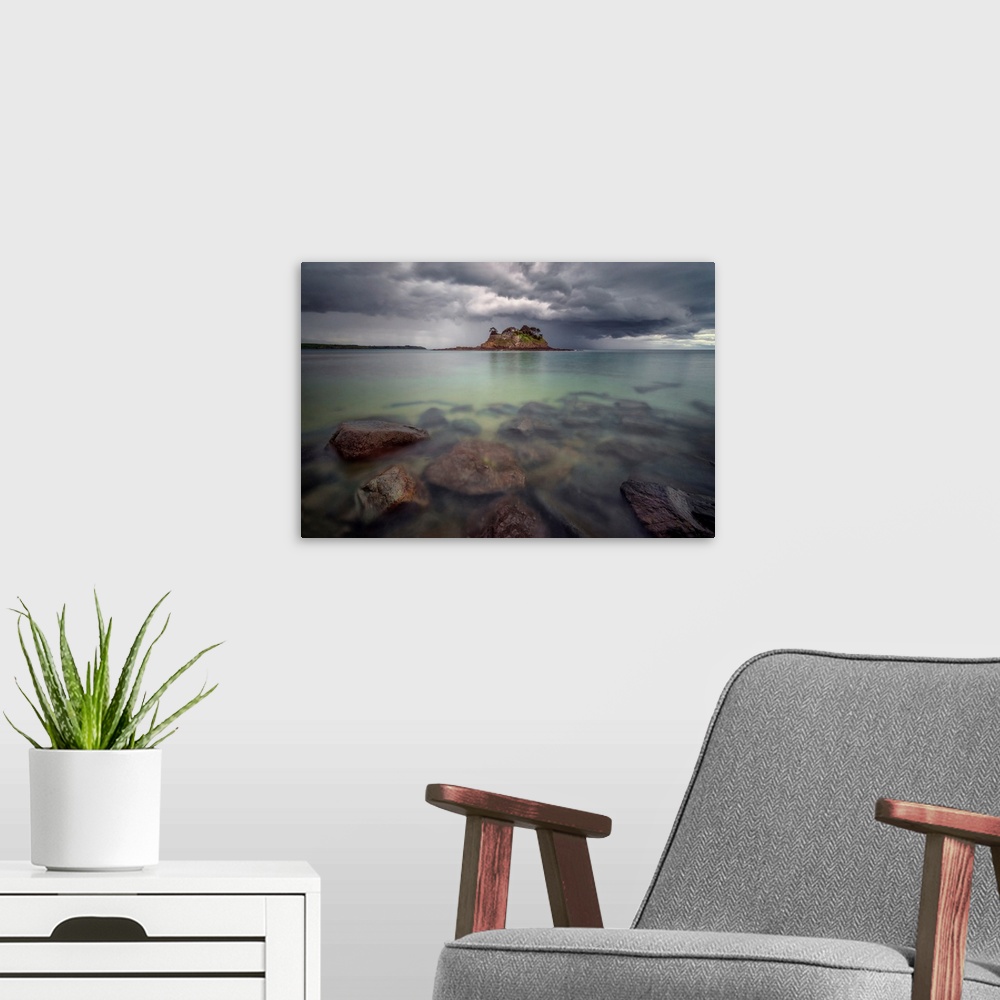 A modern room featuring Long time exposure of the shorecoast of Ile du Guesclin island and castle in Brittany, a view at ...
