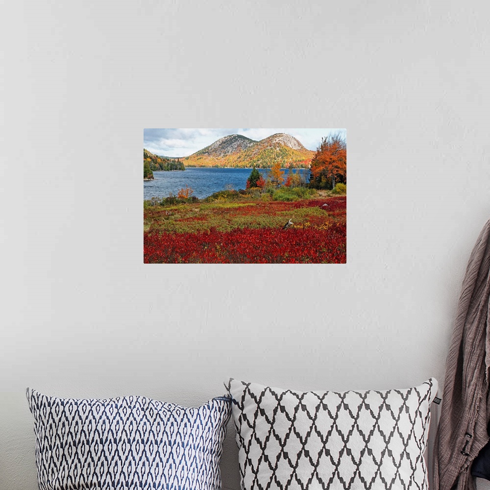 A bohemian room featuring Large, landscape photograph of Jordan Pond and the Bubble Mountains, surrounded by autumn color, ...