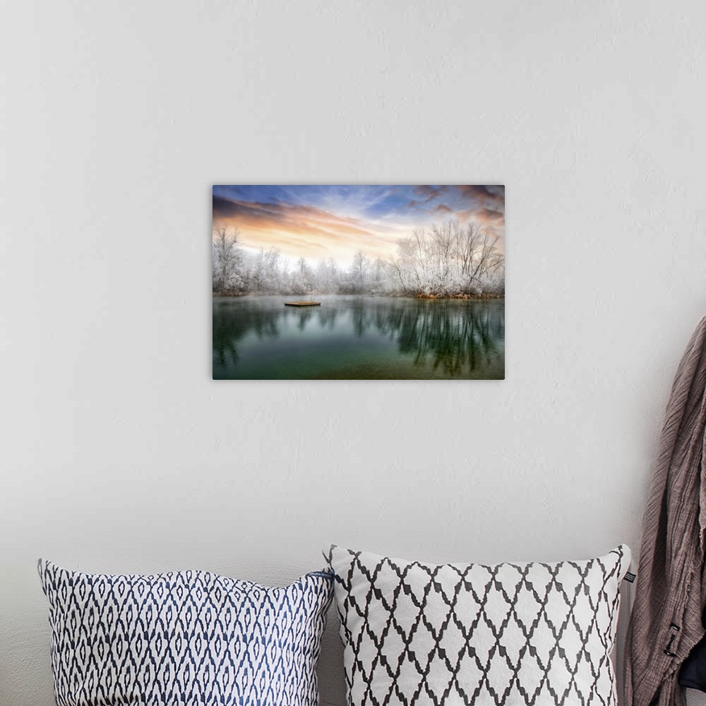 A bohemian room featuring Photograph of a cold sunset across from a lake lined with frozen trees.